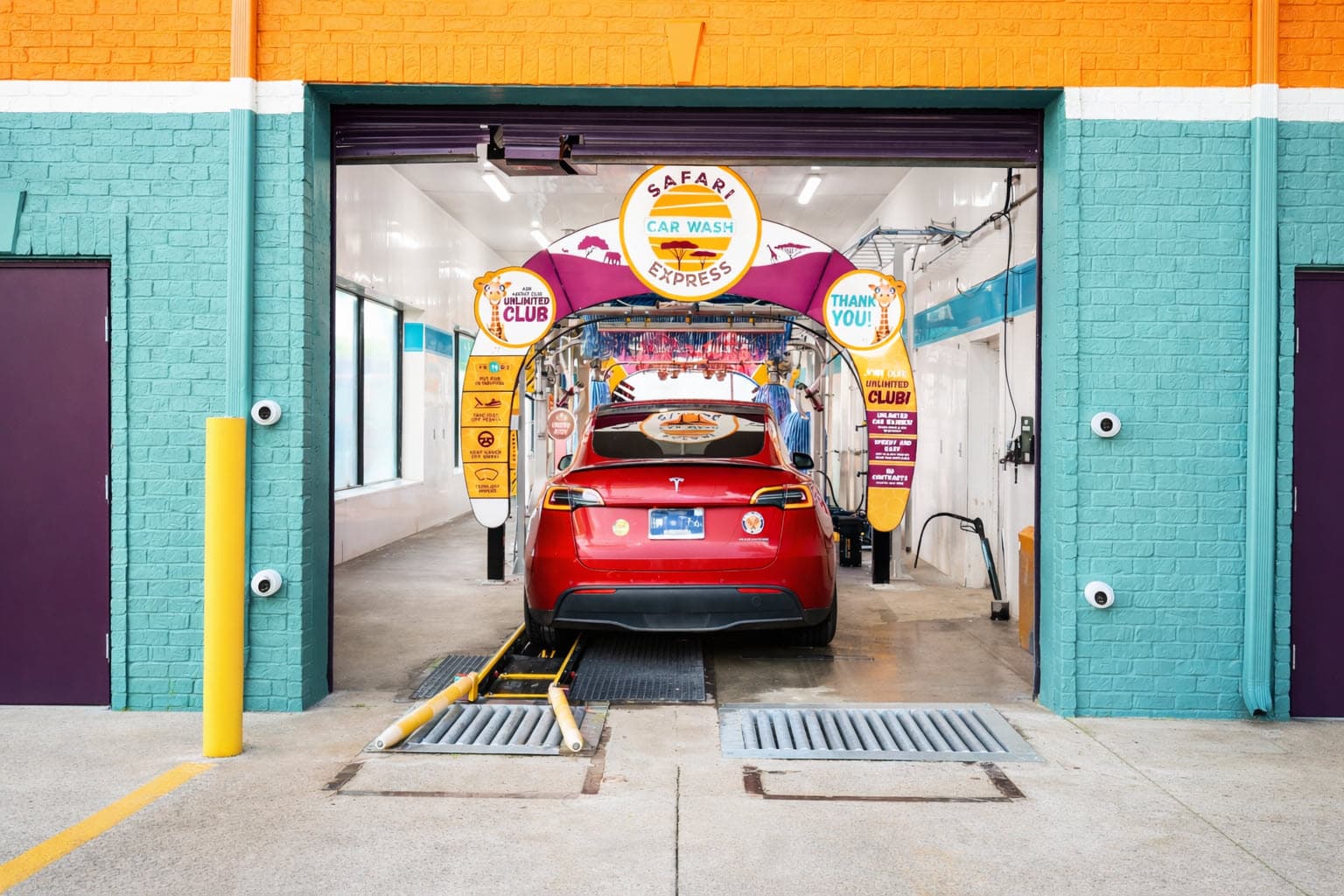 Safari Car Wash tunnel with foam curtains creating a thorough clean